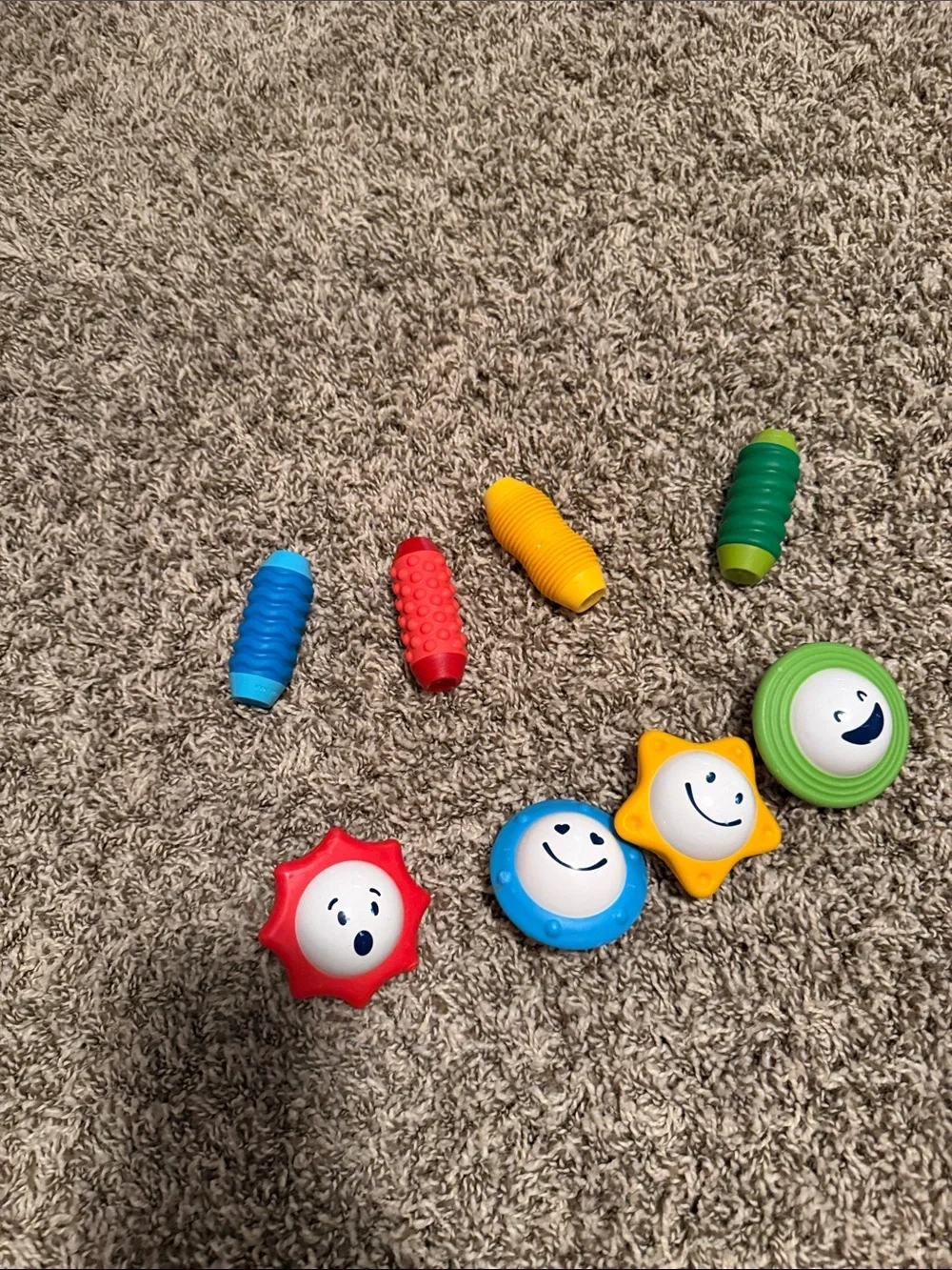 Colorful Smile Sensory Magnetic Rattle Set - Blue, Red, Yellow, Green